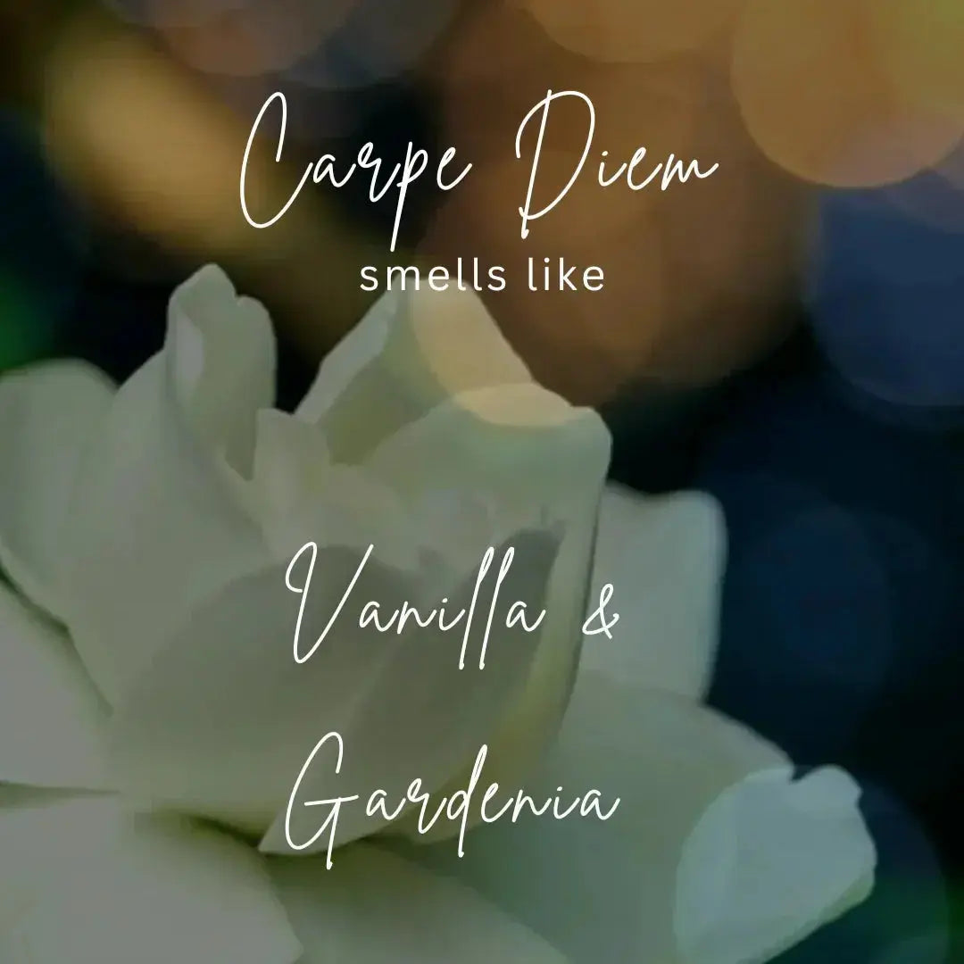 White gardenia flower with text Carpe Diem, smells like vanilla and gardenia, bokeh background